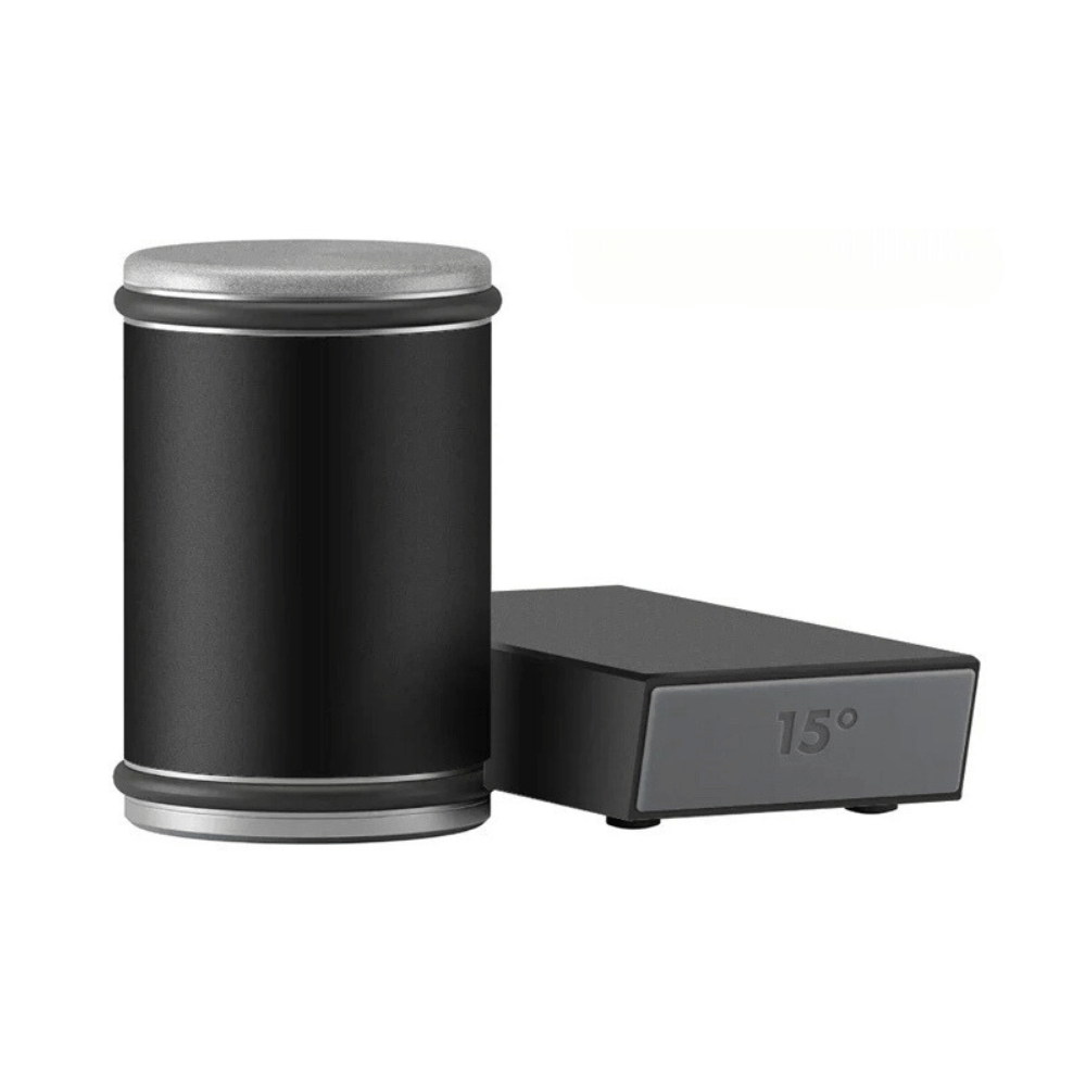 Black cylindrical container with a metallic lid and a rectangular device labeled '15°' on a white background.