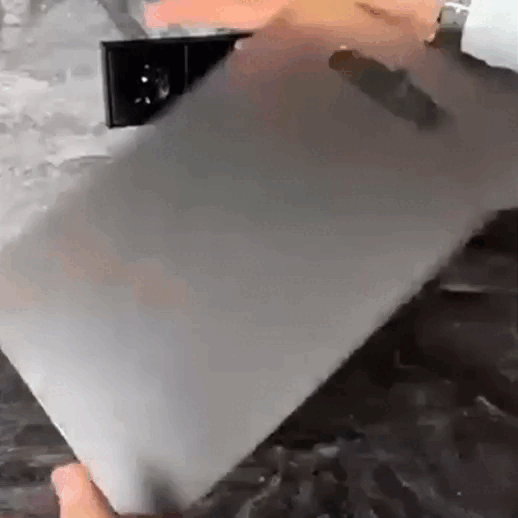 Titanium Cutting Board used for chopping vegetables—large double-sided stainless design for efficient meal prep