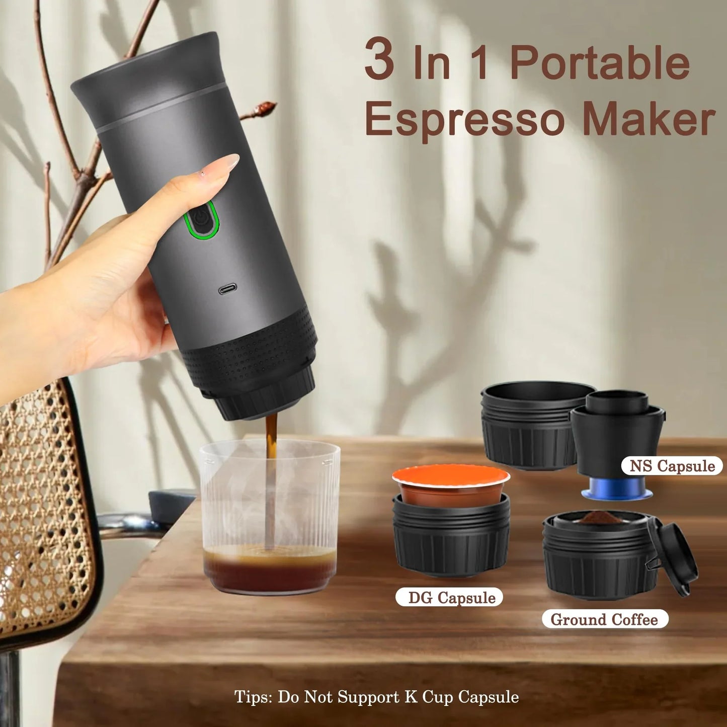 3-in-1 portable espresso maker being used to pour coffee into a glass, with additional capsules and coffee types displayed on a wooden surface.